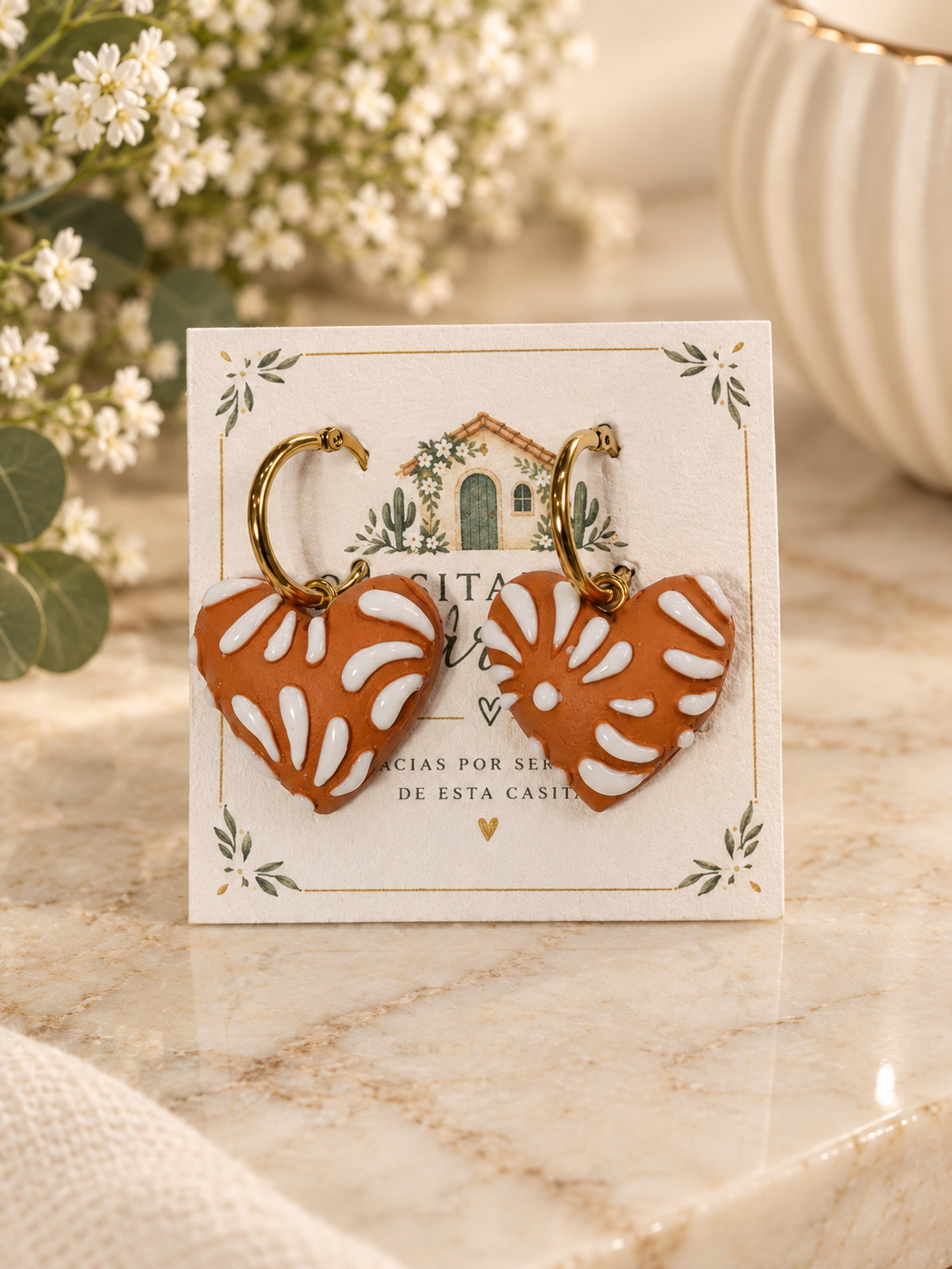 Mexican Talavera Clay earrings/white on brown hearts